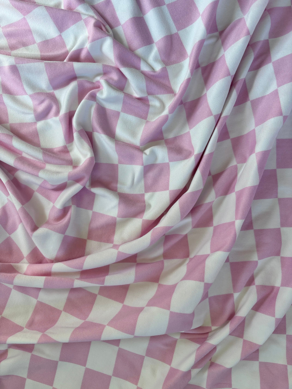 Pink & White Checkered Stretch Swaddle — Little Mae & Co