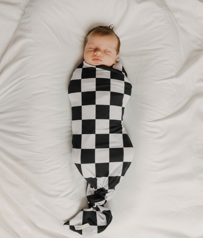 Race Black & White Checkered Stretch Swaddle — Little Mae & Co