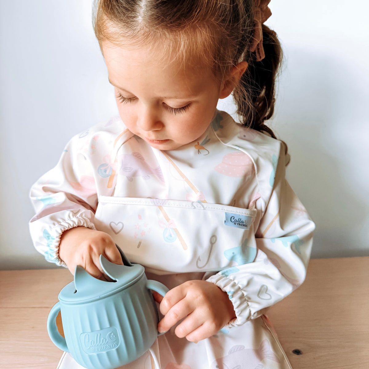 The Grayson Long Sleeve Bib - Lakeside Blooms — Calla and Friends