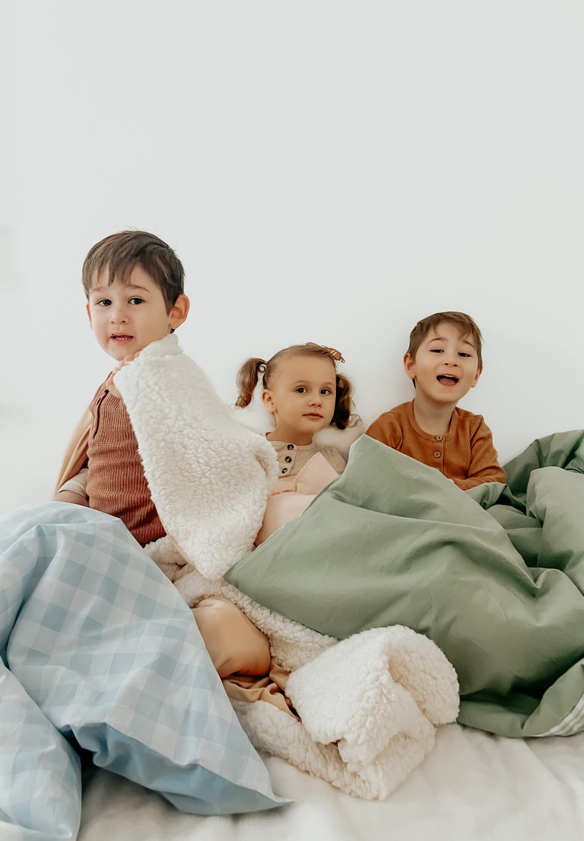 Marine Checkered Quilted Blanket — Little Mae & Co